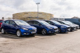car photography - a line of blue cars