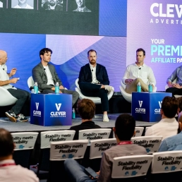 Panel discussion on stage at SBC Summit Americas sponsored by Clever Advertising